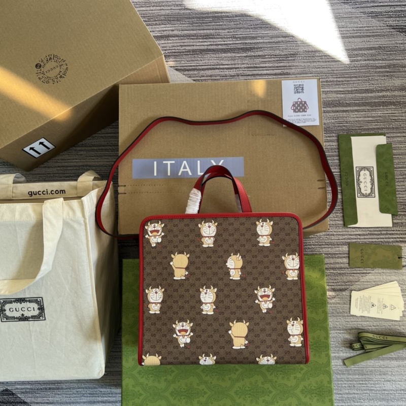G*u*i shopping bags